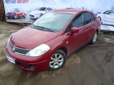 400 x 300 Nissan Tiida 2010. ()  
