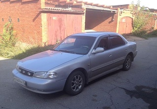 637 X 441  73.5 Kb Kia Clarus 1996 . /