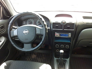 1920 X 1440 557.4 Kb 1920 X 1440 479.1 Kb Nissan Almera 2009 .   