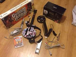 960 X 720 159.0 Kb  Nintendo Wii + Guitar Hero