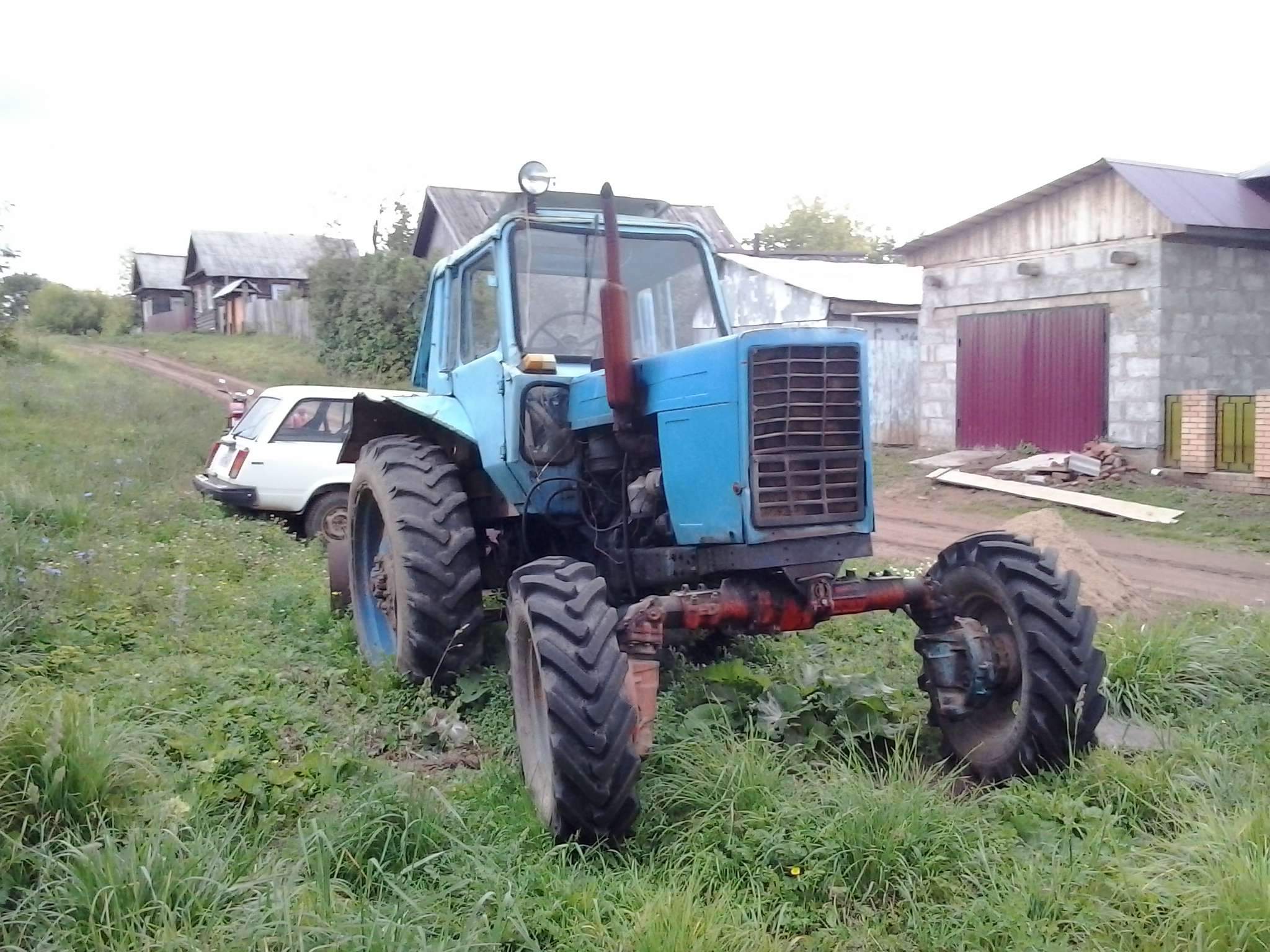 МТЗ 82 С ножом сзади